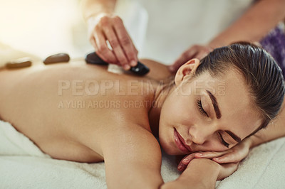 Melt away stress with a hot stone massage